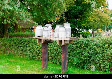 Rusty old milk cans, Mecklenburg-Vorpommern, Germany Stock Photo