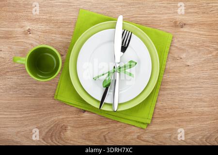 Fork with knife, blank plates and napkin Stock Photo