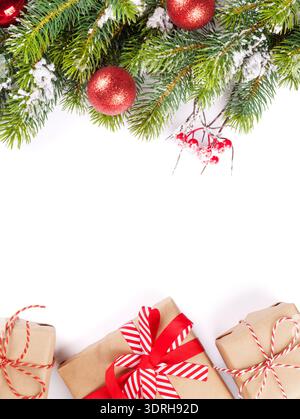 Christmas tree branch with gift boxes Stock Photo