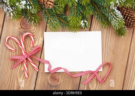 Christmas tree branch and blank greeting card Stock Photo