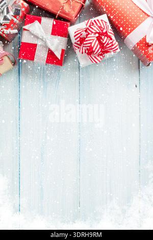 Christmas gift boxes on wooden table Stock Photo