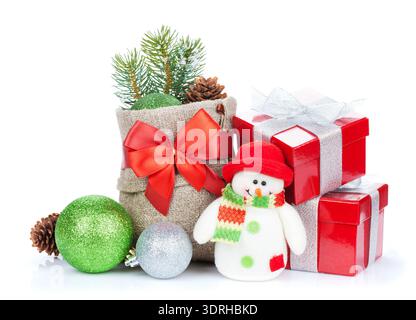 Christmas gift boxes, decor and snowman toy. Isolated on white background Stock Photo