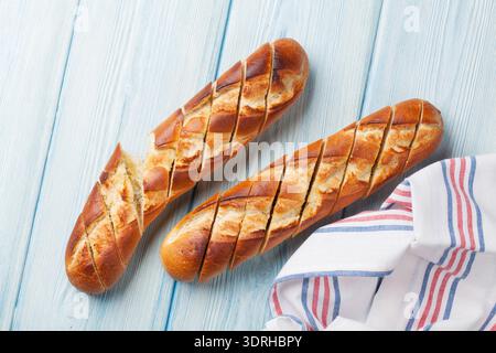 Sliced bread on wooden table. View from above Stock Photo