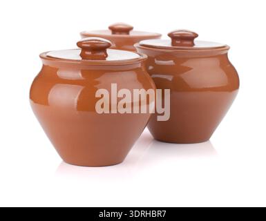 Three clay pots. Isolated on white background Stock Photo