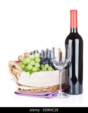 Red wine bottle, glass and grapes. Isolated on white background Stock Photo
