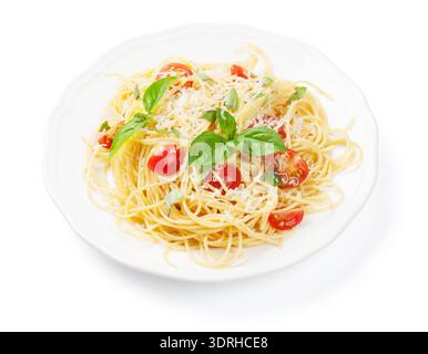 Spaghetti pasta with tomatoes and basil. Isolated on white background Stock Photo