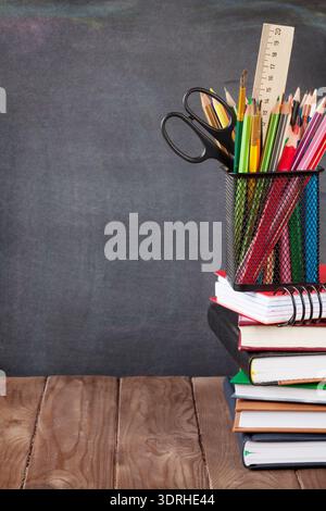 School and office supplies on classroom table Stock Photo