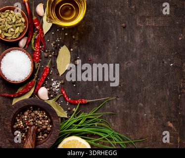 Various spices on wooden background Stock Photo