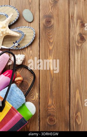 Travel and vacation items on wooden table Stock Photo