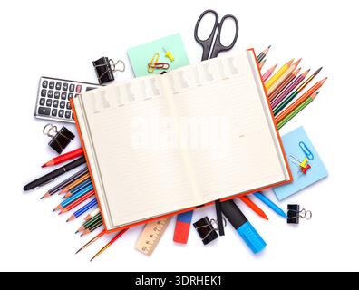 Blank notepad over school and office supplies on office table Stock Photo