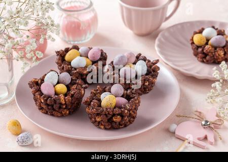 Easter chocolate rice nest cake with mini candy eggs Stock Photo