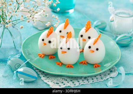 Funny eggs chicks. Easter idea for festive dinner Stock Photo