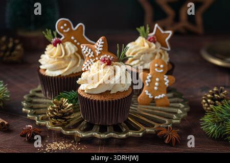 Christmas  cupcakes with gingerbread  cookies Stock Photo