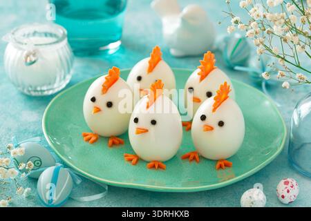 Funny eggs chicks. Easter idea for festive dinner Stock Photo