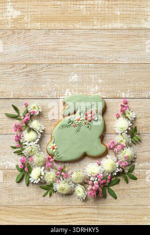 Wooden background with easter bunny cookies Stock Photo