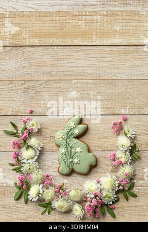 Wooden background with easter bunny cookies Stock Photo