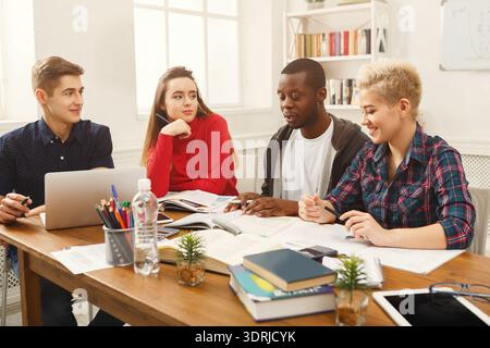 Group of Students Collaborating in a Study Session for School Assignments and Projects Stock Photo
