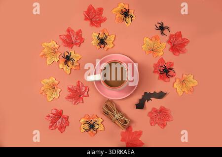 Autumn composition flat lay seasonal background with maple leaves, coffee, spiders and bats. Happy Thanksgiving, halloween greet Stock Photo