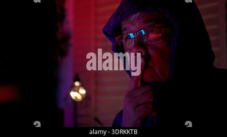 An expert hacker is decrypting data Stock Photo