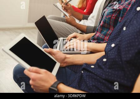 Collage of People Using Devices in a Setting Focused on Technology and Communication Stock Photo