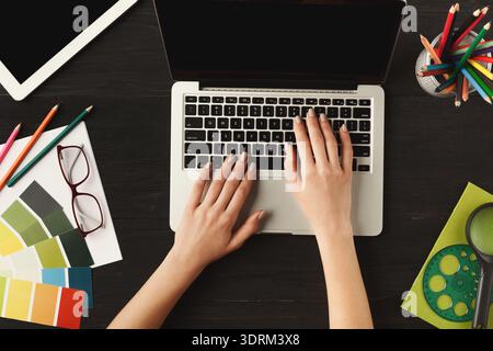 Creative Workspace Featuring Tools for Design and Color Selection Stock Photo