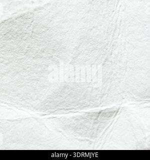 Abstract textured white paper background with creases and folds Stock Photo