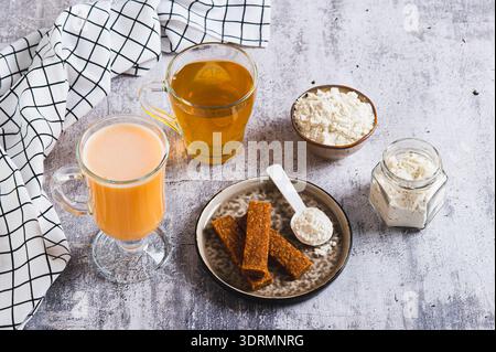 Protein nutrition and green tea for skin microbiome care set on the table Stock Photo