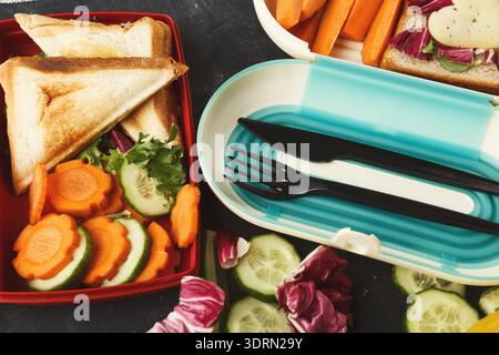 Collage of Healthy Lunch Ideas in Different Containers on a Table Stock Photo