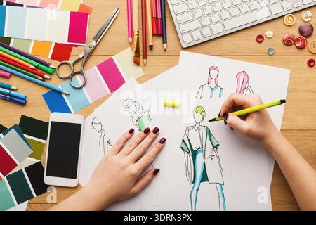 Creative Process in Design Workshop With Sketches, Tools, and Colors on Table Stock Photo