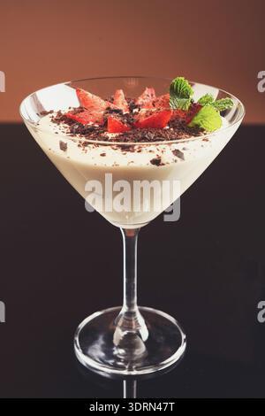 Traditional italian tiramisu in martini glass Stock Photo