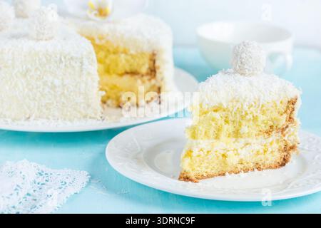 Festive lemon and coconut sponge cake Stock Photo