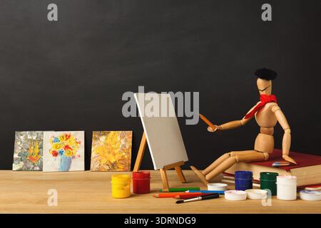 Creative Art Collage With a Model Figure Painting on an Easel and Various Artworks Displayed Stock Photo