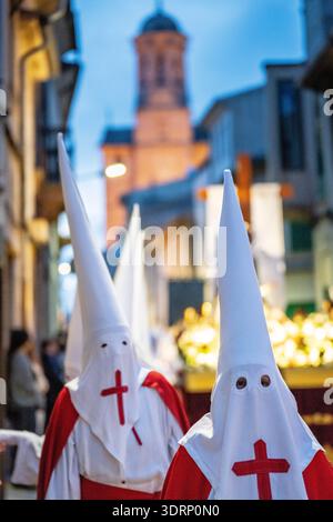 Holy Week Masks Hooded brothers with conical hats that serve as masks, Holy Week ...