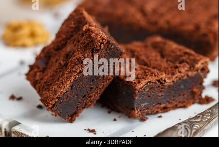 Homemade chocolate brownies with walnuts. Truffle pie. Delicious dessert close-up. Selective focus Stock Photo