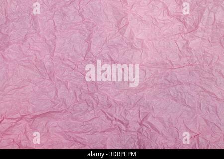 Textured background of pink crumpled paper. The concept of the celebration Stock Photo