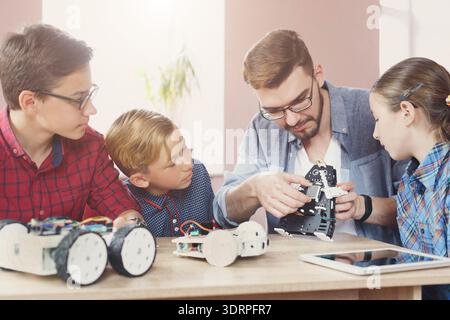 Students Learn About Robotics in Hands-On Workshop Stock Photo
