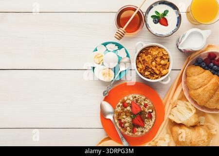 Collection of Breakfast Items Arranged on a Table With Many Different Foods and Drinks Stock Photo