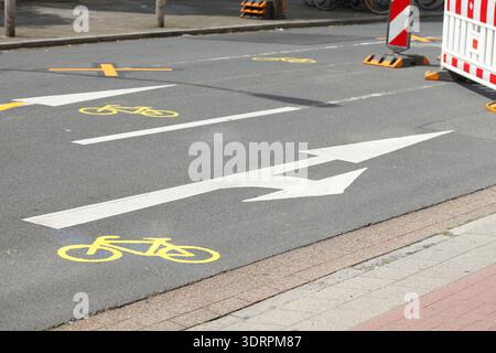 Road marking direction arrow, cycle path, diversion Stock Photo