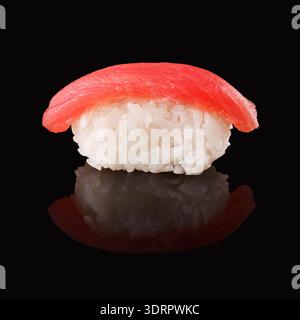 Art From Small Pieces Shows Colorful Sushi on Clean Black Background Stock Photo