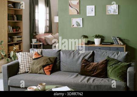 Modern Living Room Interior Featuring Comfortable Sofa and Decorative Pillows Stock Photo