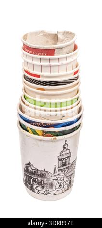 stacked disposable cups with stains showcasing casual and used appearance perfect for illustrating waste or coffee culture Stock Photo