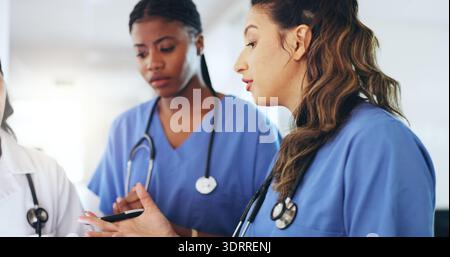 Woman, doctors and discussion with team at hospital for planning, strategy and insight for healthcare. People, group and medical professional with Stock Photo