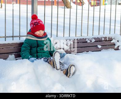 02.02.2026 - Minsk, Belarus - A child having fun playing with a snow Stock Photo