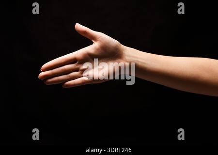 Hand Reaching out for a Handshake in a Collage of Different Hand Positions and Gestures Stock Photo