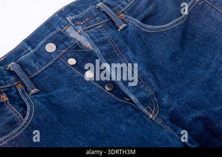 Button width close up. Levi Strauss blue denim jeans. Ukraine, Kyiv - October 2, 2025 Stock Photo