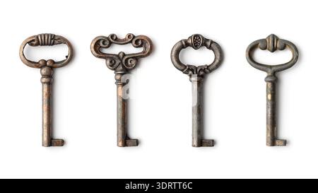 Set of beautiful vintage brass keys isolated on white background. Antique decorative objects symbolizing history, security, mystery, access, and timel Stock Photo
