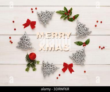 Unique Collage of Christmas Decorations Featuring Letters and Silver Trees in a Circle Stock Photo