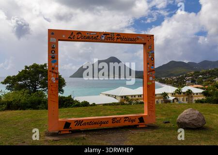 view of Le Morne Larcher mountain called the reclining woman or la femme couchée from viewpoint at Le Diamant, Martinique, Caribbean in December Stock Photo