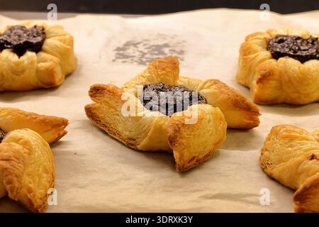 Traditional Finnish Christmas cakes called Joulutorttu. Puff pastry with plum cream. Very tasty. Stock Photo