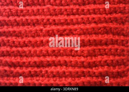 Red Crochet Fabric Texture Background – Handmade Knitted Textile Pattern Close Up Stock Photo